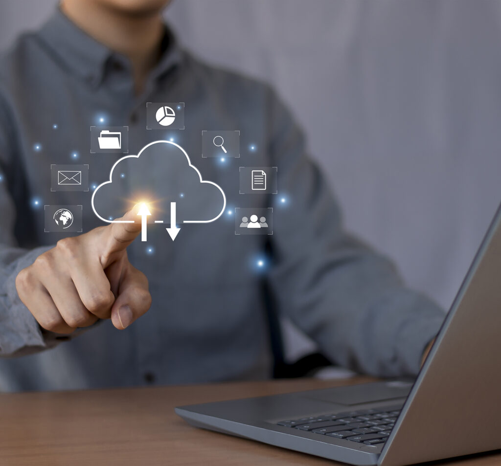 Man is pointing Laptop with Cloud Middle It